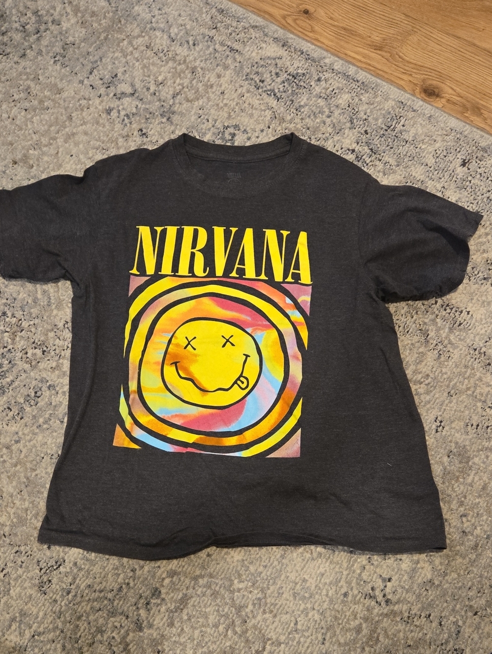 NIRVANA Black Tee with Yellow Tie-Dye Smiley Graphic